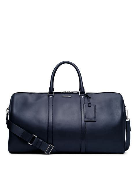 michael kors mens duffle|Michael Kors suitcase.